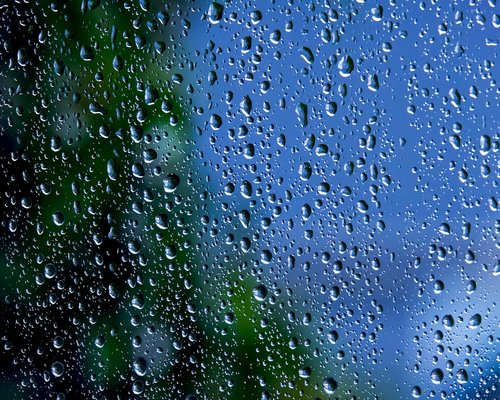 A glass of water by the window in the morning